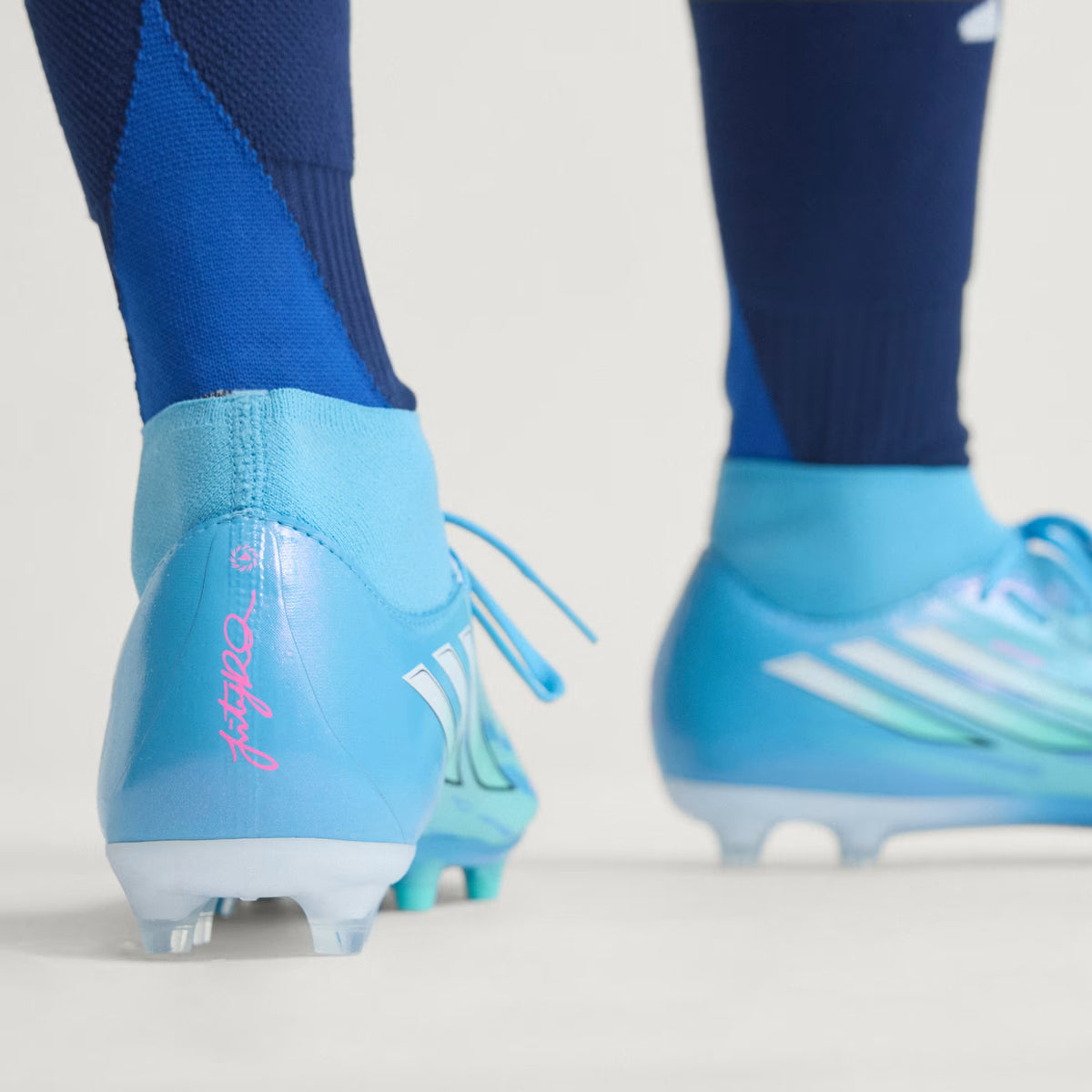 F50 Sparkfusion League Mid Cut Firm Ground / Artificial Grass Football Boots
